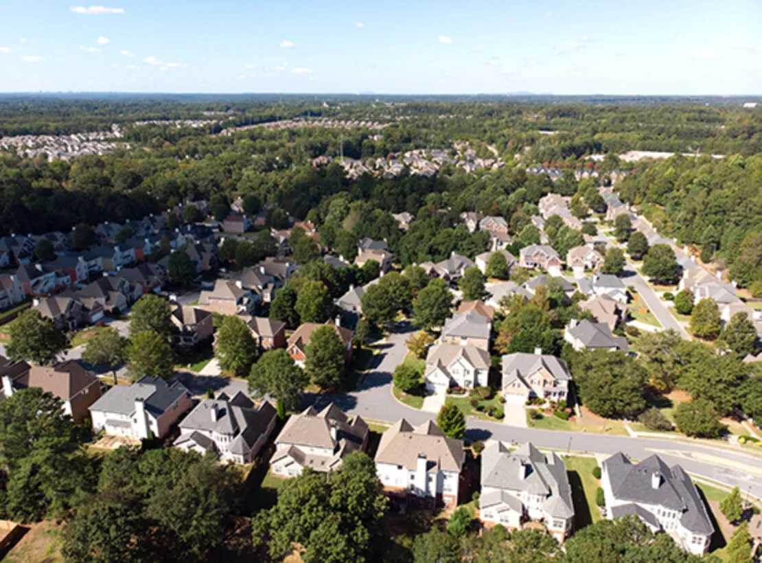 Aerial view of neighborhoods and houses in Johns Creek.