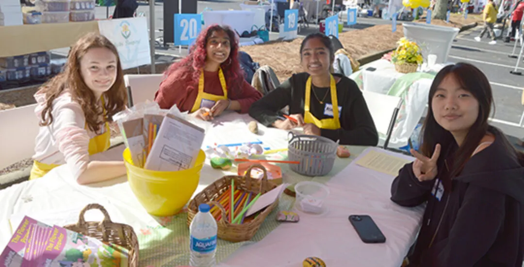 Volunteers sitting at a table